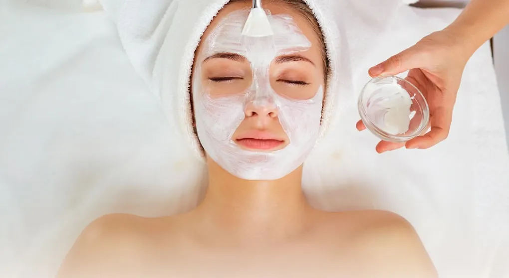 A facial in progress in a private treatment room at Pacific Massage & Head Spa in Redmond, Washington